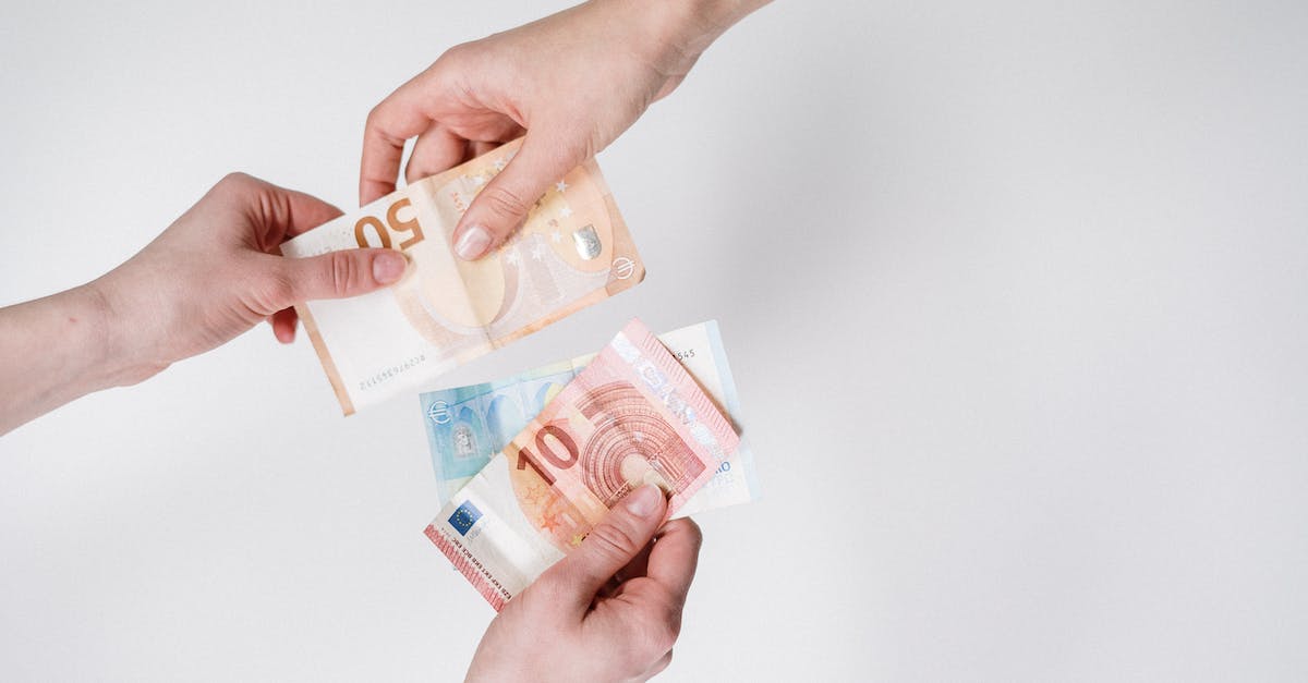 When is the cost incurred for rejecting a contract? - Person Holding 10 and 10 Euro Banknotes