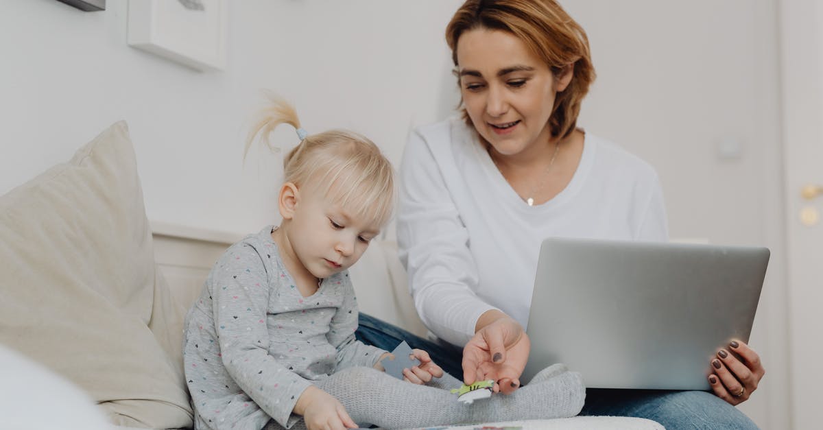 When should I be using wallride? - Girl Playing and her Mother Using Laptop