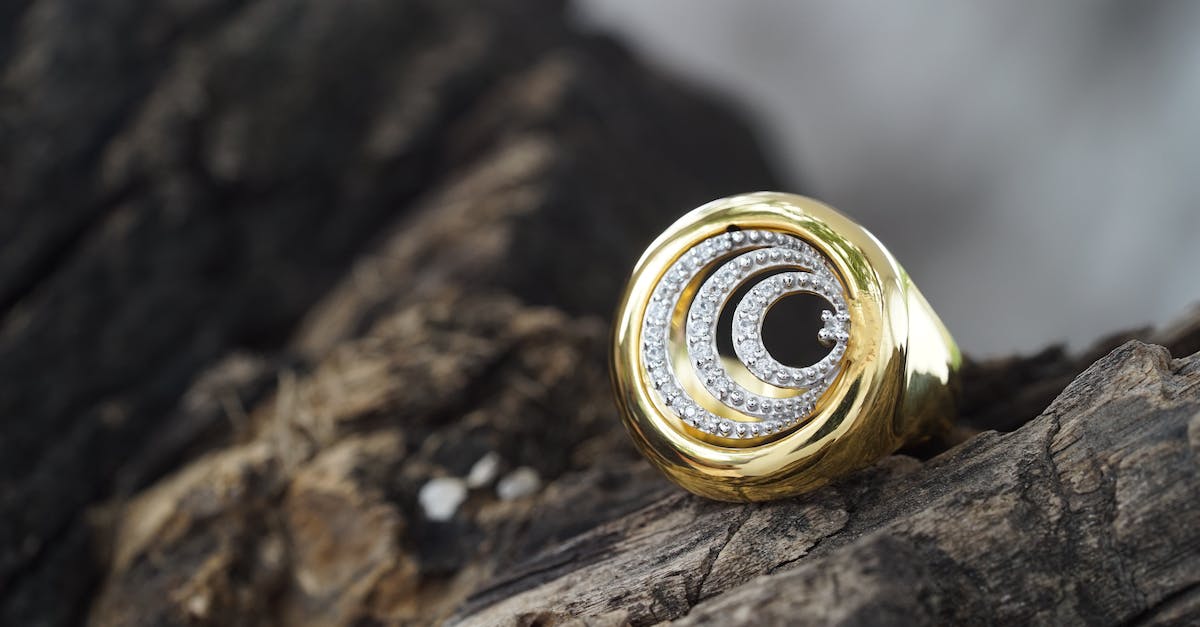 When the effect of invigorating gemstone procs, does it do so before or after taking damage? - Precious accessory with shiny small diamonds set in gold placed on wood at daytime When the effect of invigorating gemstone procs, does it do so before or after taking damage? - Precious accessory with shiny small diamonds set in gold placed on wood at daytime