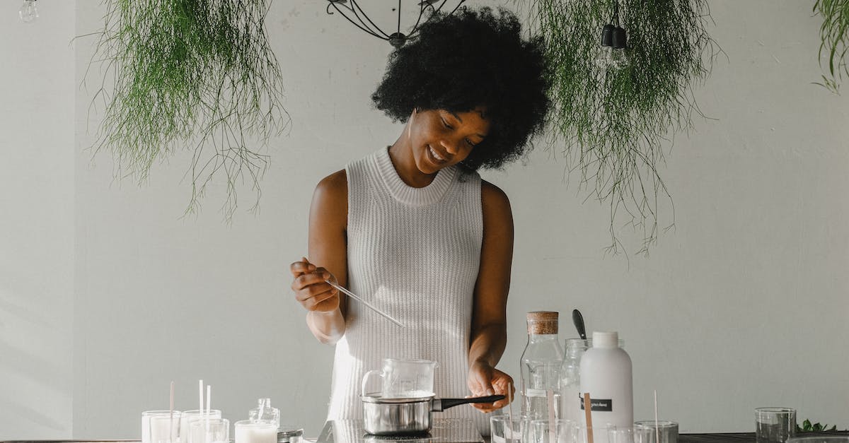 When using Deadly Re-entry, how can I add heat shielding to unshielded parts? - Smiling woman making candles in workshop When using Deadly Re-entry, how can I add heat shielding to unshielded parts? - Smiling woman making candles in workshop