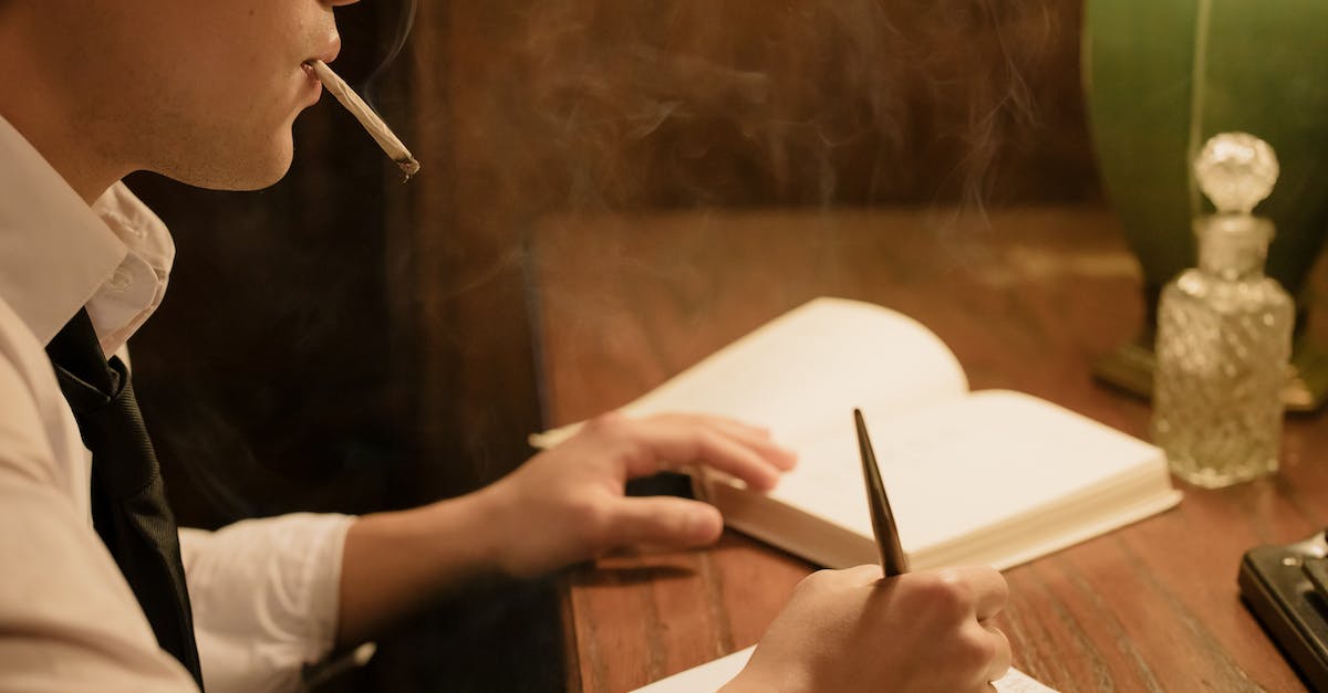 When were headshots possible in the series? - Man Smoking and Writing on His Notebook When were headshots possible in the series? - Man Smoking and Writing on His Notebook