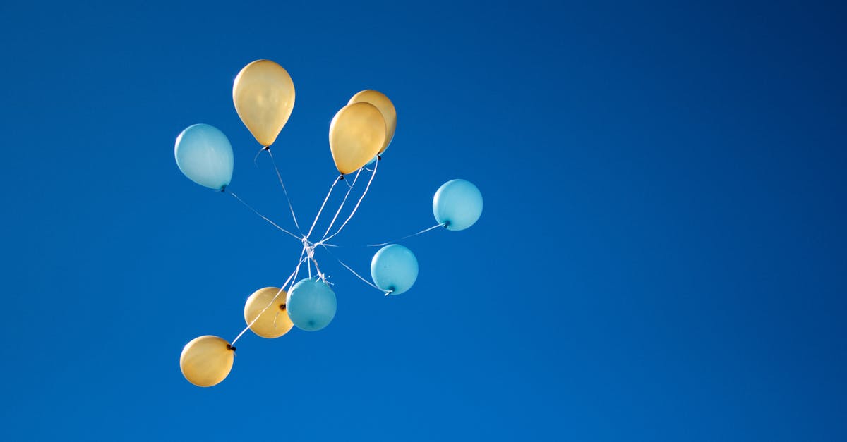 When will the launch celebration end? - Photo of Yellow And Blue Balloons On Sky