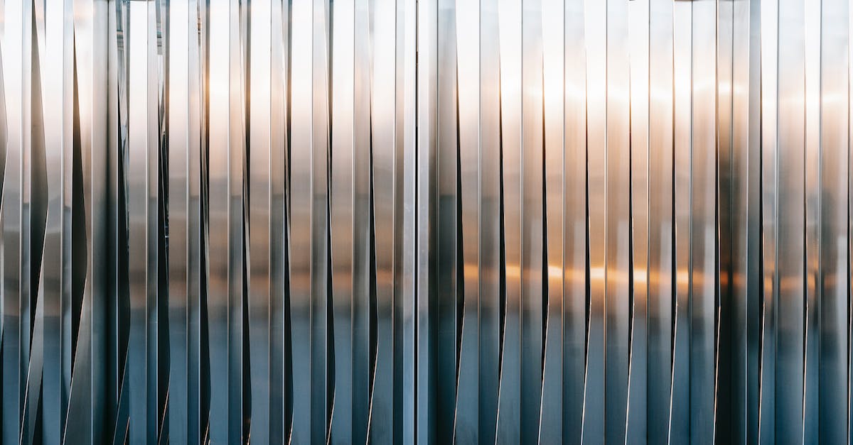 Where's a good place to mine a solid amount of iron ore? - Closed metal gates with uneven surface