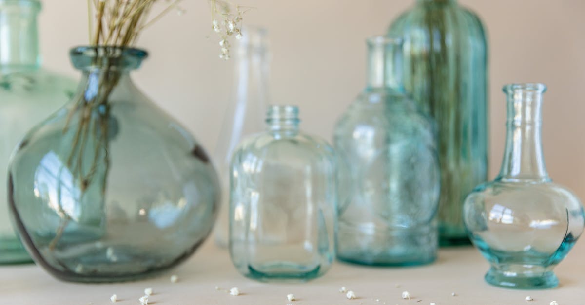 Where's Codsworth? - Three Clear Glass Bottles on White Table