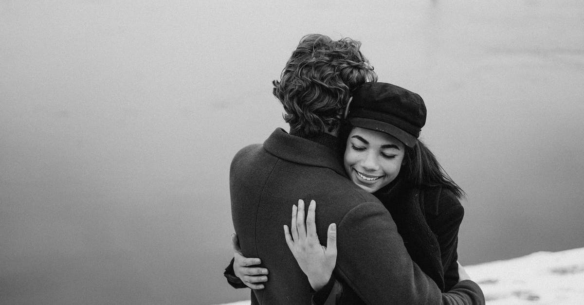 Where's the bobblehead stand? - Photo of Couple Hugging Each Other Where's the bobblehead stand? - Photo of Couple Hugging Each Other