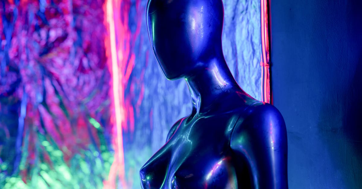 Where and in what configuration are the user created statue images stored in Dwarf Fortress? - A Mannequin in Front of Neon Lights Background Where and in what configuration are the user created statue images stored in Dwarf Fortress? - A Mannequin in Front of Neon Lights Background