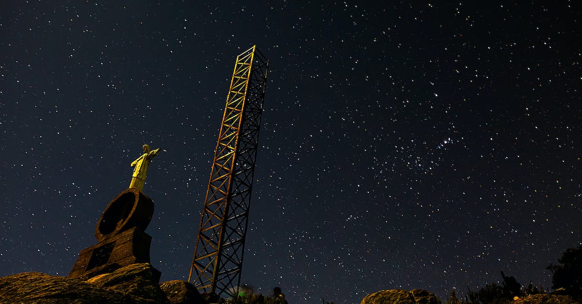 Where are all the star stones? - From below of spectacular scenery of metal radio tower on background of night sky with stars