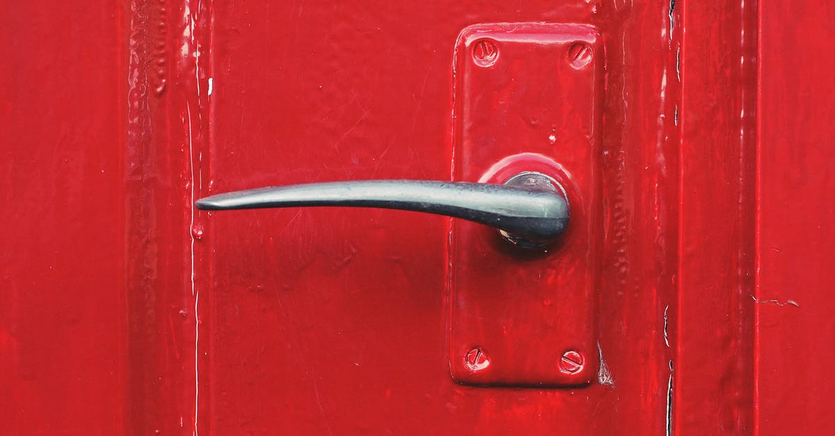 Where are the Silver Doors in the Labyrinth? - Metal door handle on a red door