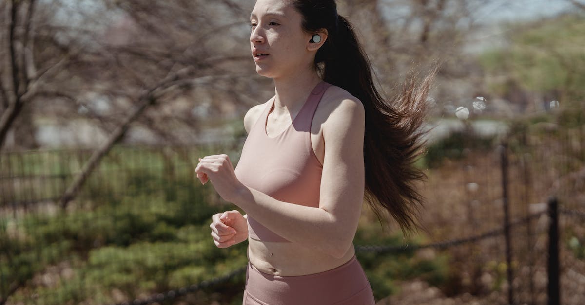 Where are TowerFall replays stored on OS X? - Woman in White Tank Top and Brown Skirt Standing and Smiling