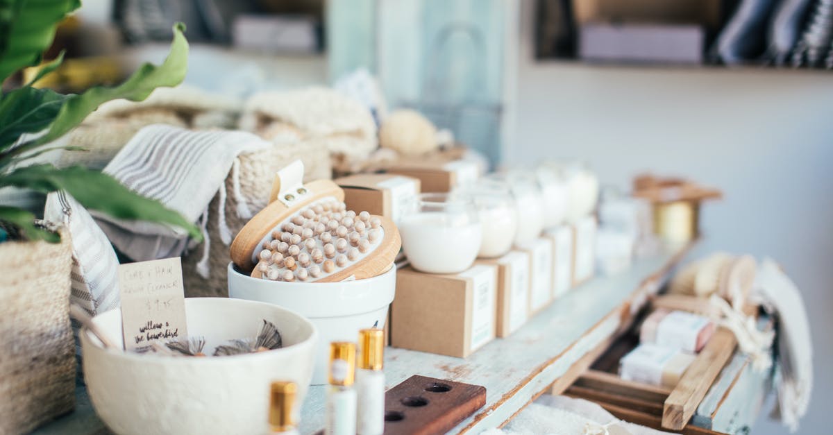Where can I store my cosmetic gear? - Many fragrant candles placed near massage brushes and perfume in shop for sale Where can I store my cosmetic gear? - Many fragrant candles placed near massage brushes and perfume in shop for sale