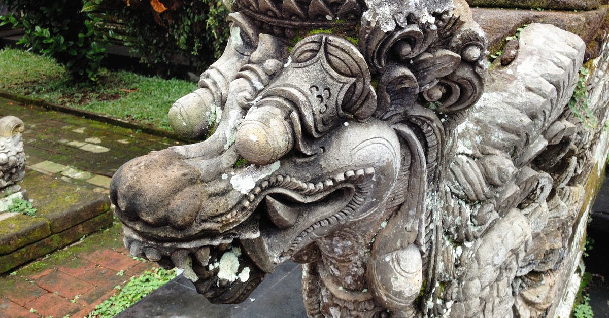 Where can you find the dragon of Eldin Volcano? - Gray Concrete Statue Near Green Plants Where can you find the dragon of Eldin Volcano? - Gray Concrete Statue Near Green Plants