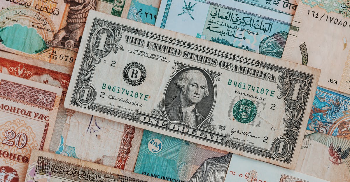 Where did the 18,446,744,073,709,551,616 number come from? - Collection of banknotes with dollar bill on top