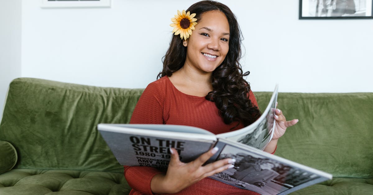 Where did the missing magazines go from my magazine rack? - Woman in Red Shirt Reading Magazine