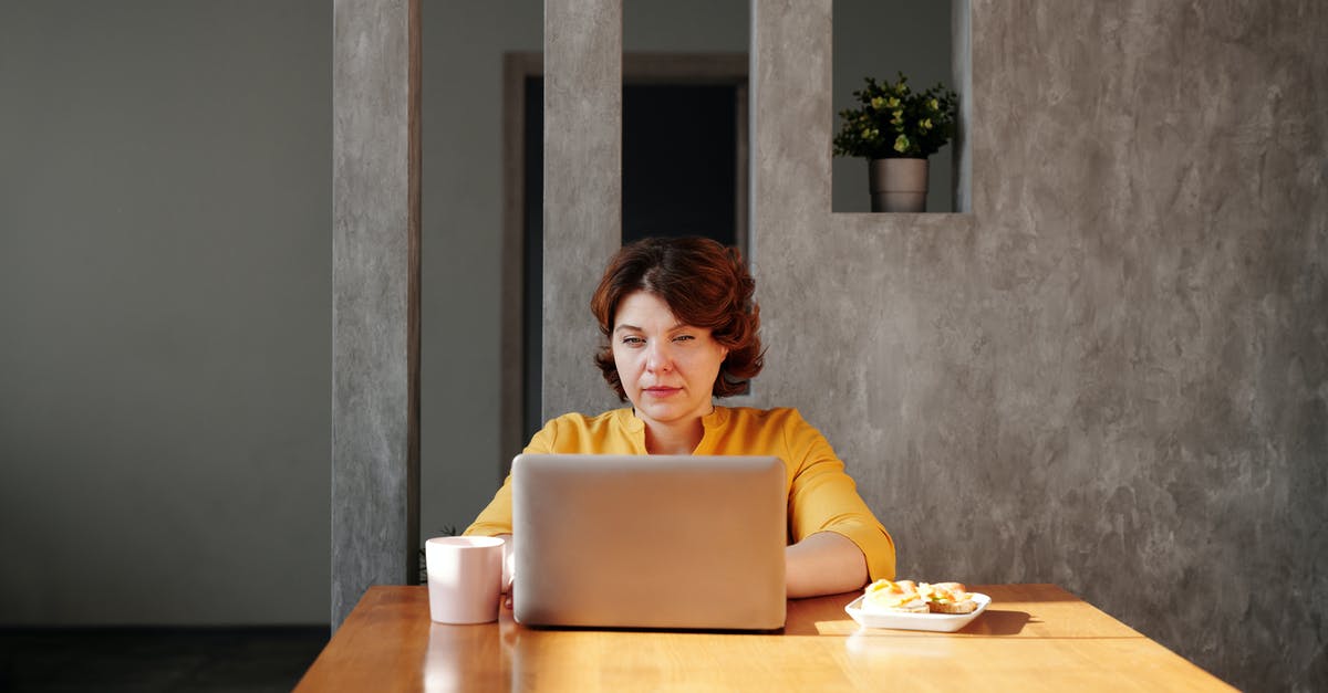 Where do Fallout Shelter screenshots get saved on PC version? - Woman Using MacBook Where do Fallout Shelter screenshots get saved on PC version? - Woman Using MacBook