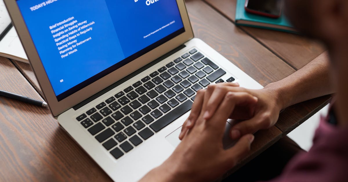 Where do I access the Online Contracts Introduction? - Person in Front of his Laptop