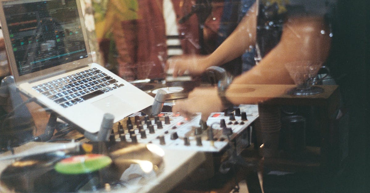 Where do I find the disk needed for the computer? - Person Using Audio Mixer Controller
