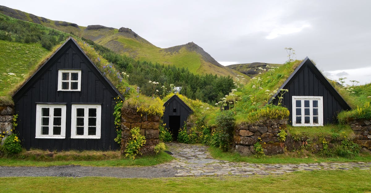 Where do I get the villagers to start off an iron farm - House on Green Landscape Against Sky Where do I get the villagers to start off an iron farm - House on Green Landscape Against Sky