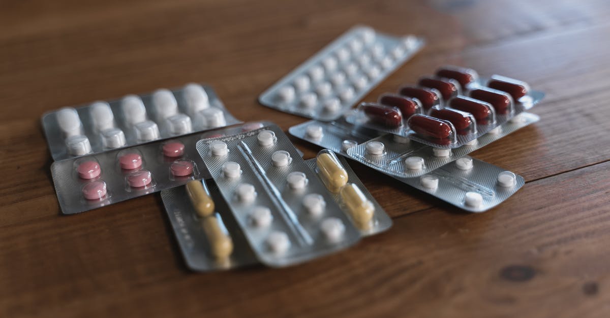 Where do unopened packs go? - Assorted Packs of Pills on a Wooden Table Where do unopened packs go? - Assorted Packs of Pills on a Wooden Table
