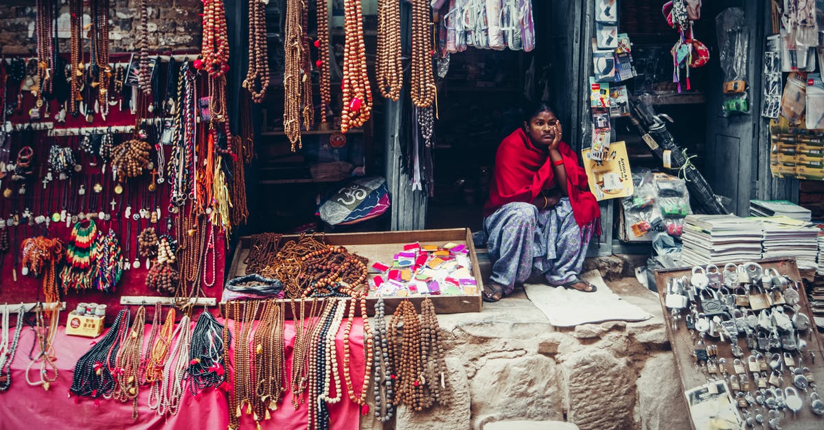 Where is Majni's merchant chest? - Female Merchant sitting on her Store 