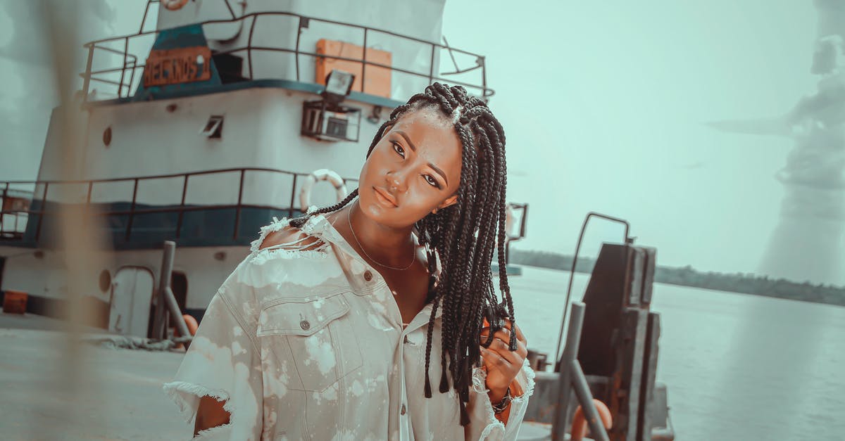 Where is my model ship? - Woman in White Button Up Shirt Standing Near White Ship Where is my model ship? - Woman in White Button Up Shirt Standing Near White Ship