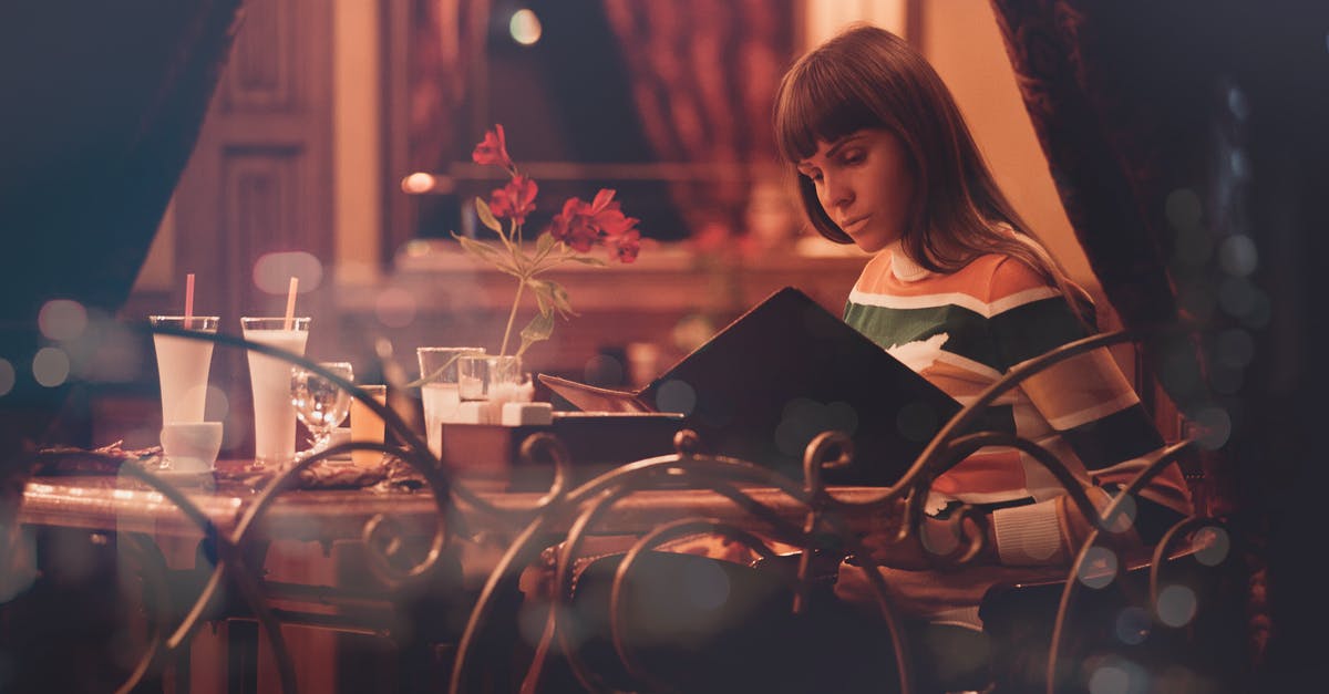Where is Rico sitting in the menu screen? - Woman Sitting in a Room