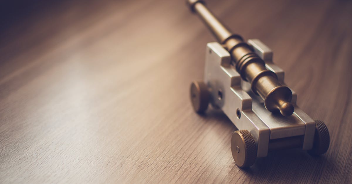Where is the 3rd bomb located? - Grey Toy Cannon on a Beige Wooden Surface