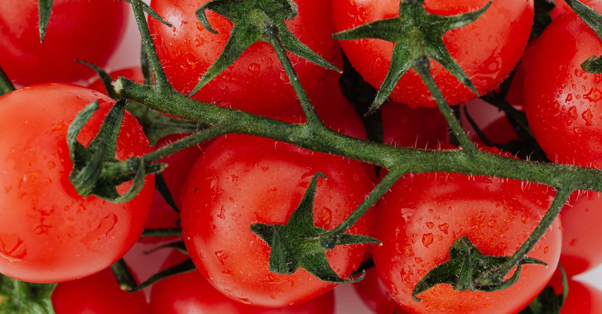 Where is the best place to farm each of the rarer materials? - Bunch of fresh ripe tomatoes on branch