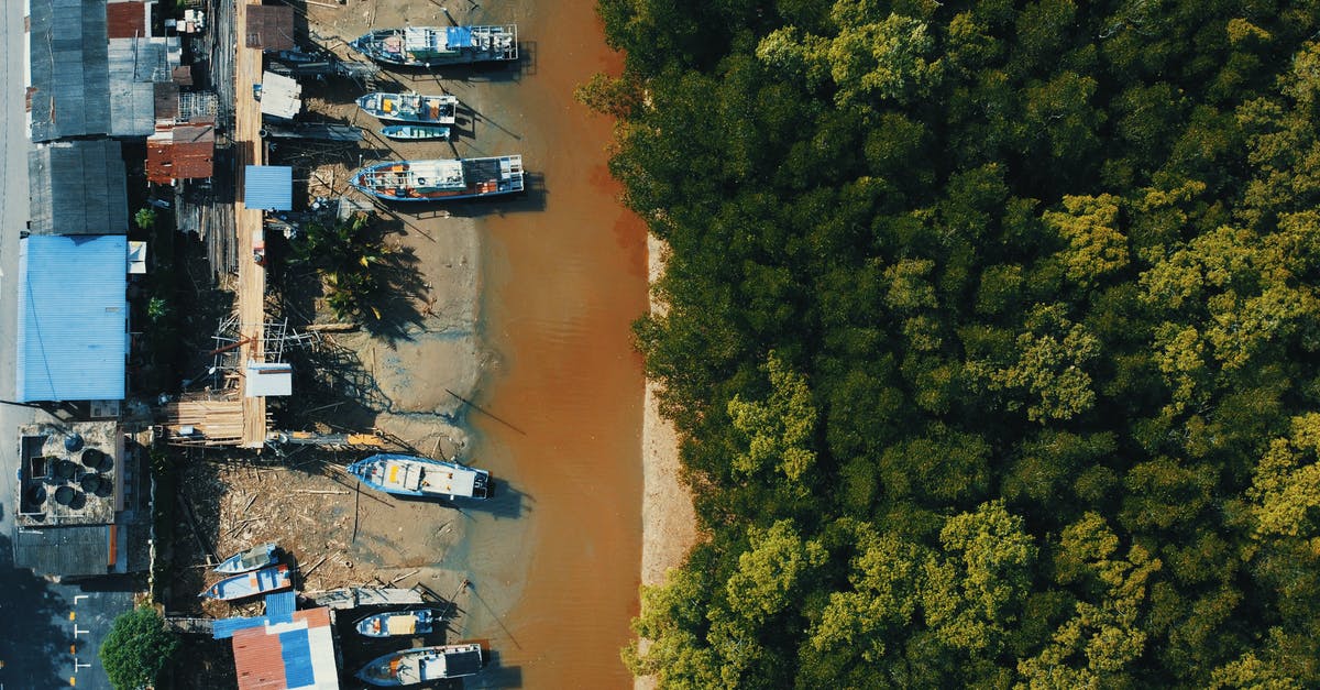 Where is the bunker at Fiddler's Green Trailer Estates? - Boats on Port Near Houses
