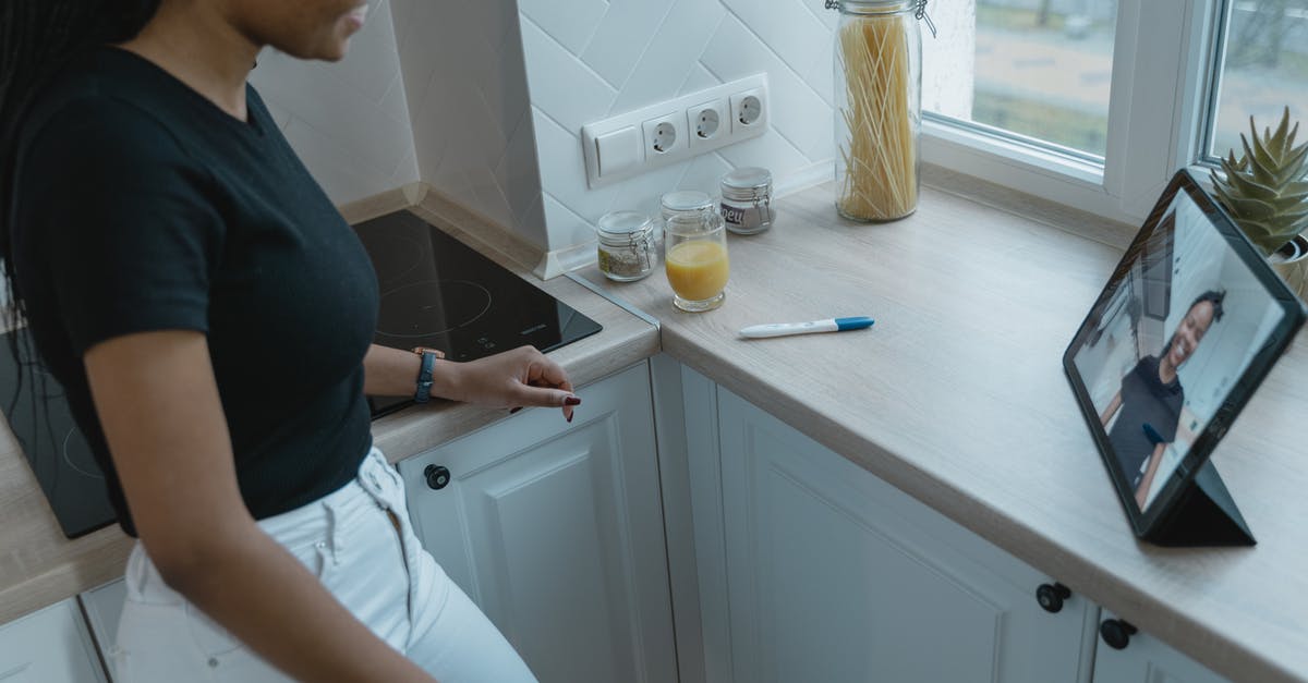 Where is the program scheduler on the iPad version? - Man in Black T-shirt Standing Near Sink Where is the program scheduler on the iPad version? - Man in Black T-shirt Standing Near Sink