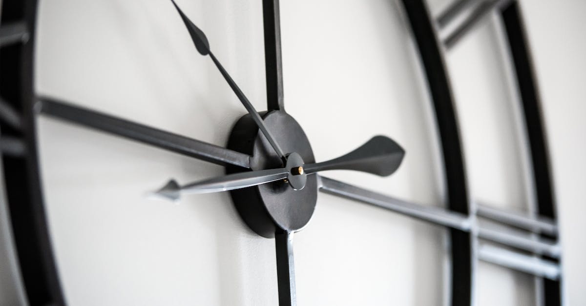Where is the second part of the Fighter's guild questline? - Modern clock on white wall