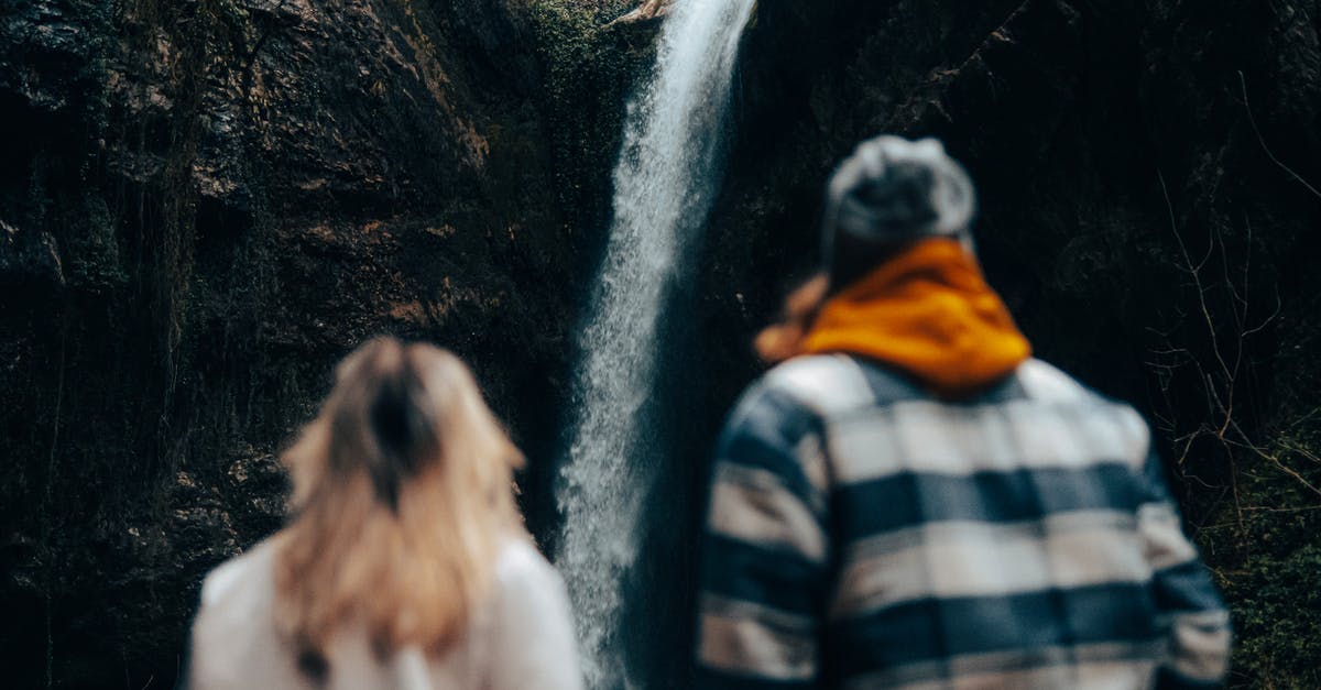 Where is this non-multiple of 5 XP coming from? - Unrecognizable Couple Looking at Waterfall Coming from Rock