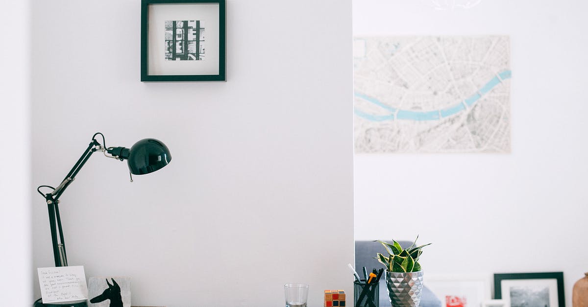 Where is this room located on the map? - Lamp with cup of stationery placed on wooden desk with potted plant in light cozy apartment Where is this room located on the map? - Lamp with cup of stationery placed on wooden desk with potted plant in light cozy apartment