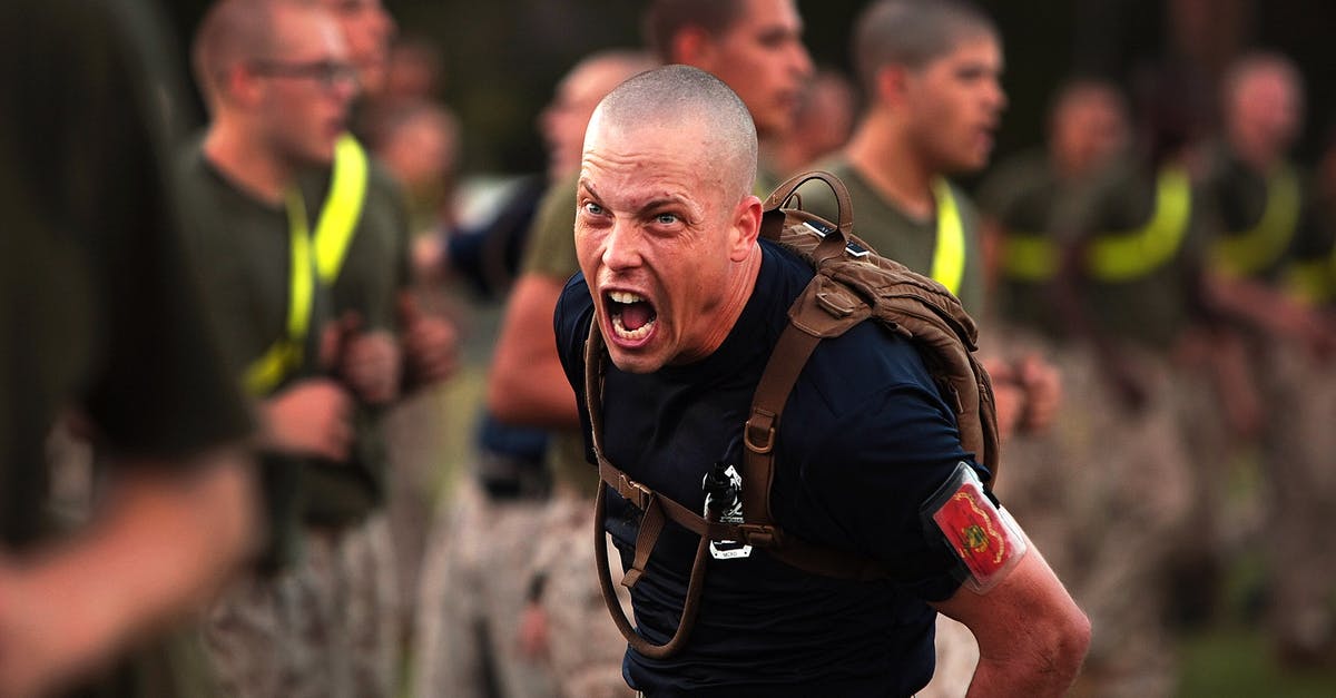 Where to enter referral code in Battle Camp? - Man Wearing Brown Backpack