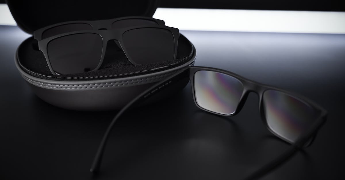 Which action is chosen in case of a tie? - Black Framed Sunglasses on Black Leather Textile Which action is chosen in case of a tie? - Black Framed Sunglasses on Black Leather Textile
