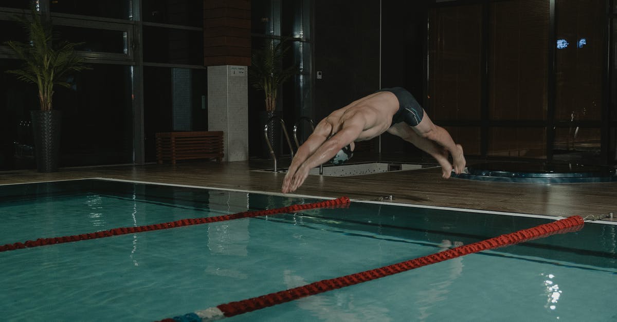 Which actions can cancel out of other actions in Dead Cells? - Man in Black Trunks Diving in the Swimming Pool