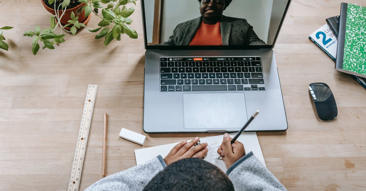Which class or classes are the most self-sufficient? - Black teacher on laptop screen during lesson with crop schoolboy Which class or classes are the most self-sufficient? - Black teacher on laptop screen during lesson with crop schoolboy