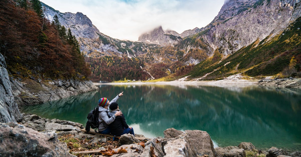 Which date in 1999 was "Action Half-Life" first released? - Couple Sitting on Rock Beside Lake Which date in 1999 was "Action Half-Life" first released? - Couple Sitting on Rock Beside Lake