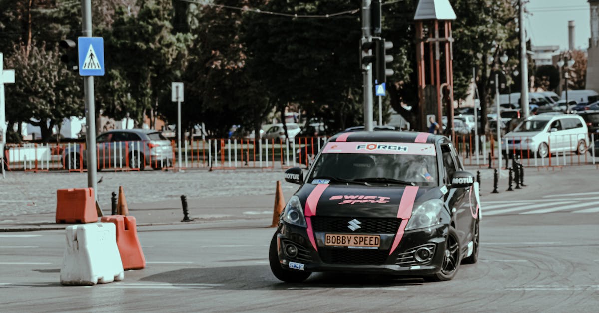 Which direction do Coconut Wheels turn if they are destroyed? - Modern colorful car driving fast while turning on empty street racing in rally