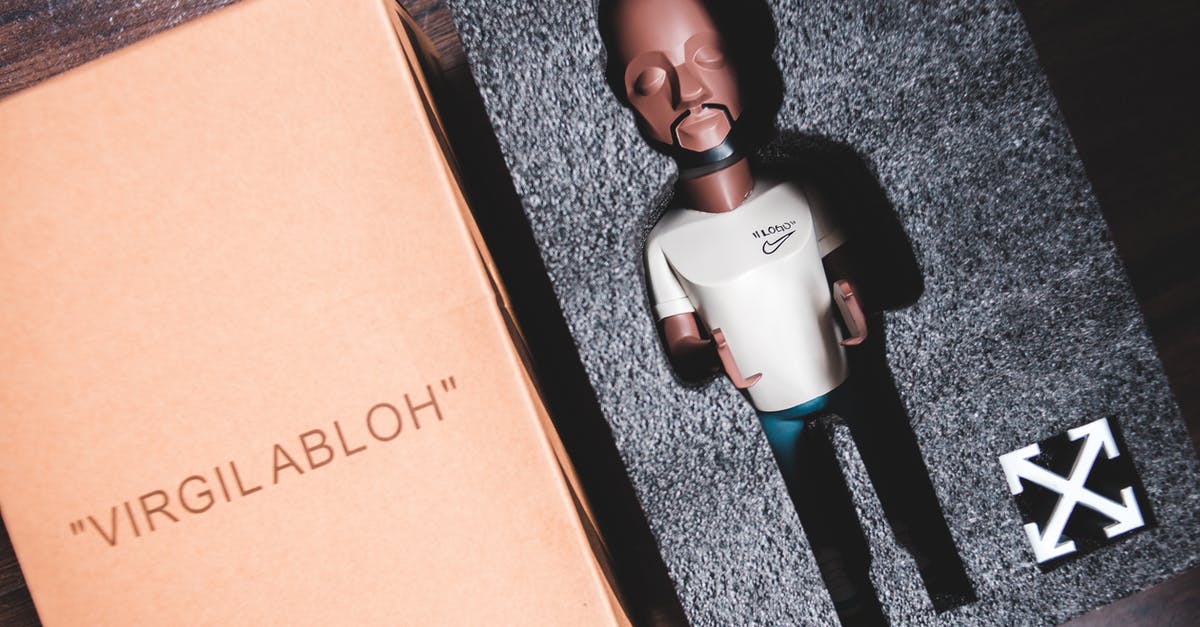 Which early game NPC is the better pack mule? - Plastic miniature in packing near carton box