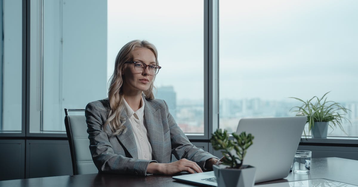 Which elite affixes cannot be dodged? - Woman in Gray Blazer Sitting by the Table