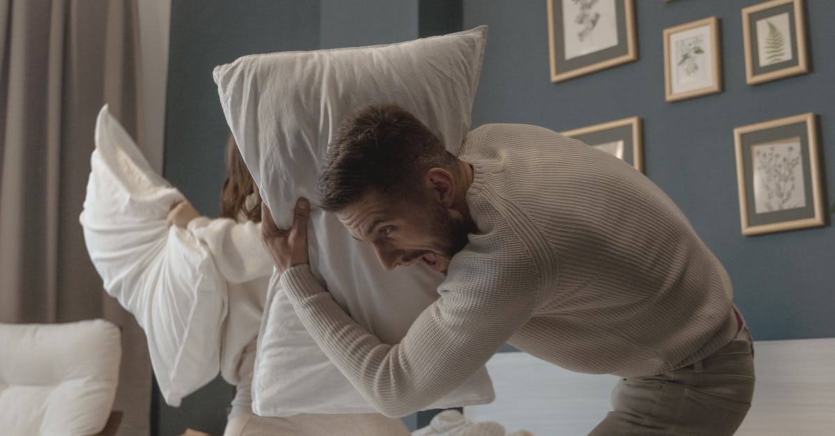 Which elo would you be playing when playing with a duo partner? - A Couple Having Fun Playing Pillow Fight
