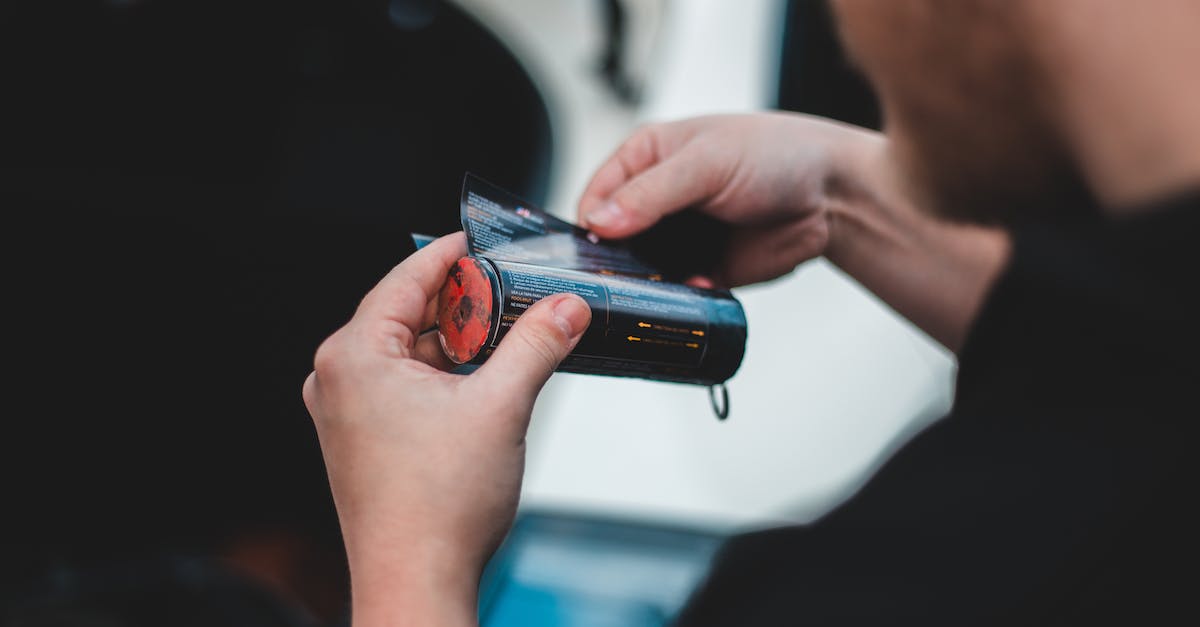 Which encrypted data can reward which level of mark of mods? - Crop man with paper roller reading data