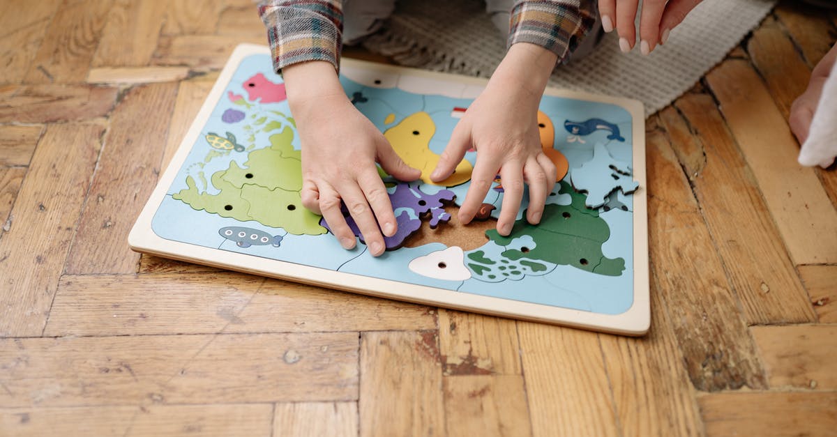 Which game is this (RPG)? - Person Holding Green and White Jigsaw Puzzle Piece Which game is this (RPG)? - Person Holding Green and White Jigsaw Puzzle Piece