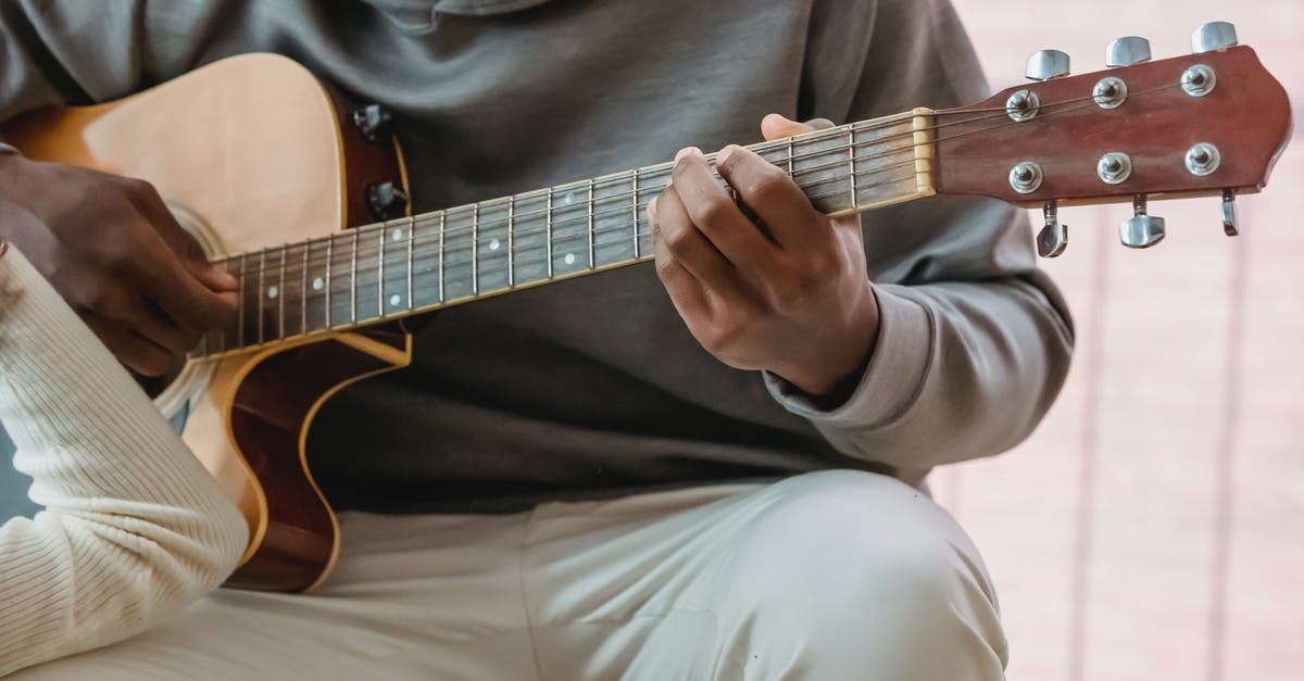 Which gun does the Double Duty talent affect? - Black man playing guitar while girlfriend listening Which gun does the Double Duty talent affect? - Black man playing guitar while girlfriend listening