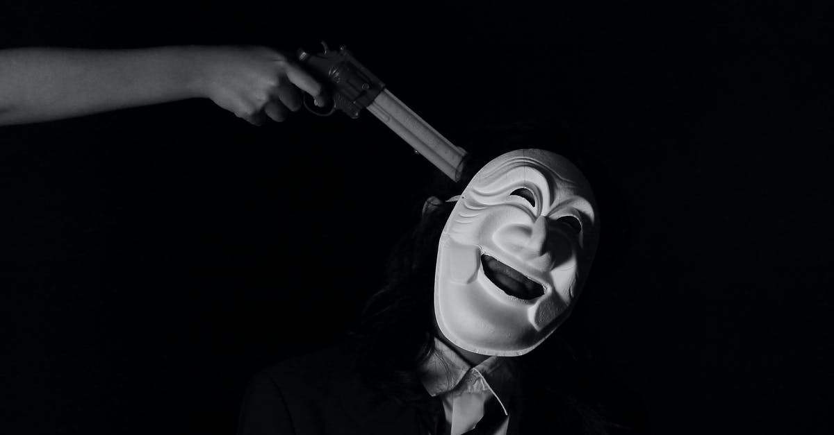 Which guns can shoot through walls? - Grayscale Photo of Person Holding a Gun