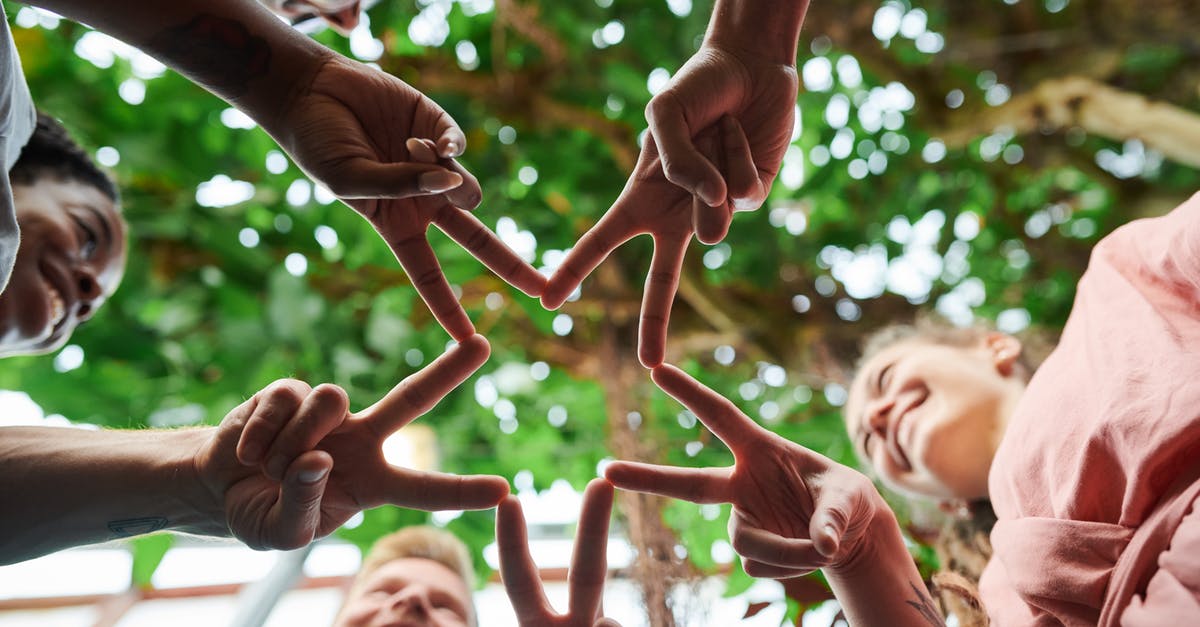 Which Lutris version works best with Star Trek Armada 2 - Low Angle Photo of People's Fingers Doing Star Shape