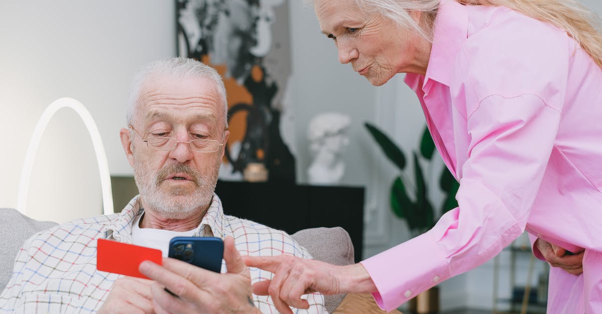 Which merchants pay best? - Man in Pink Dress Shirt Holding Black Smartphone