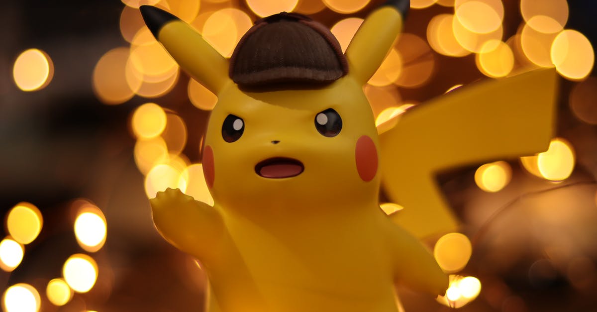 Which Pokemon is this supposed to be, Pikachu or Pichu? - Close-up Photo of Pokemon Pikachu Figurine
