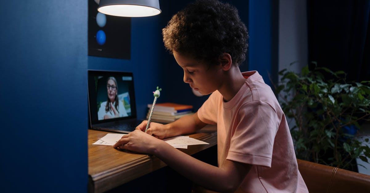 Which sniper scope has the highest zoom and where is it found? - Free stock photo of adult, afro hair, at table