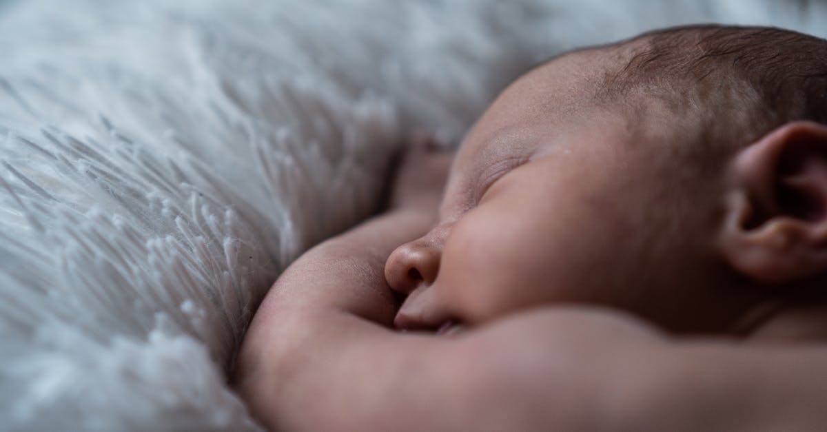 Which sword skin is this? - Baby Lying on White Textile Which sword skin is this? - Baby Lying on White Textile